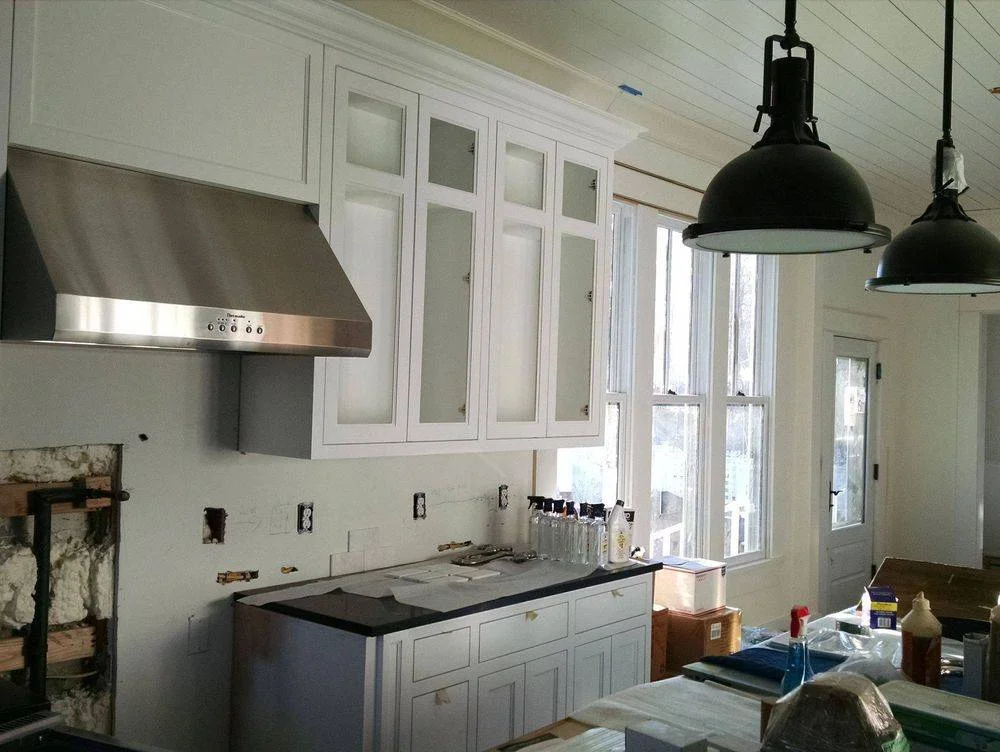 Kitchen renovation with custom hood and gas line work in Rye