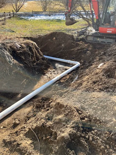 Sewer line excavation with excavator in Trumbull CT emergency replacement